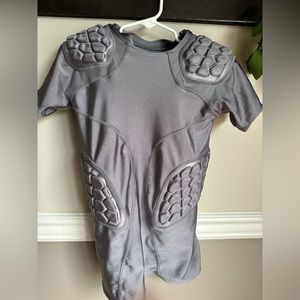 Youth medium Riddle football compression padded shirt